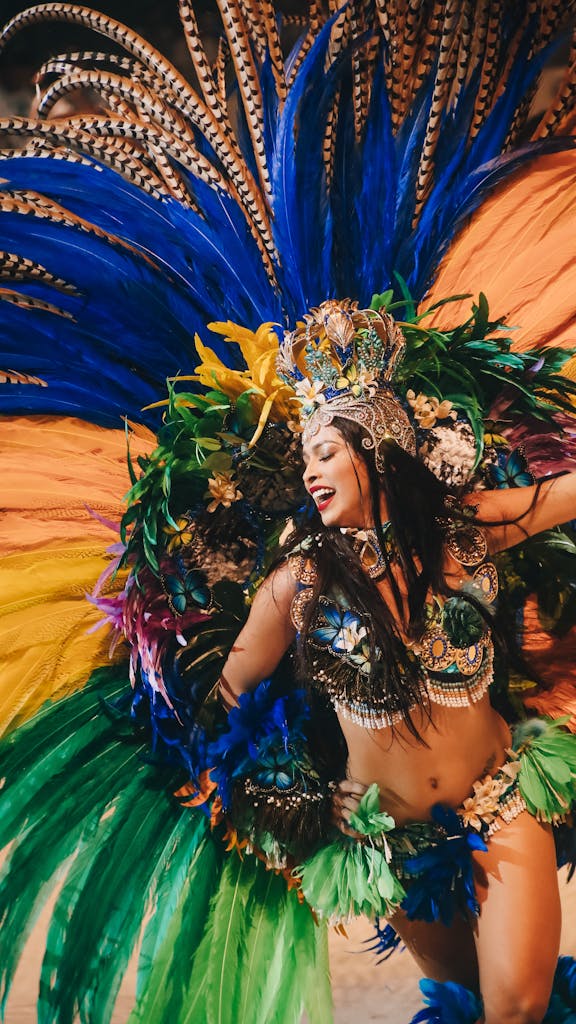 Colorful Brazilian dancer in full costume celebrating carnival in Amazonas, Brazil.